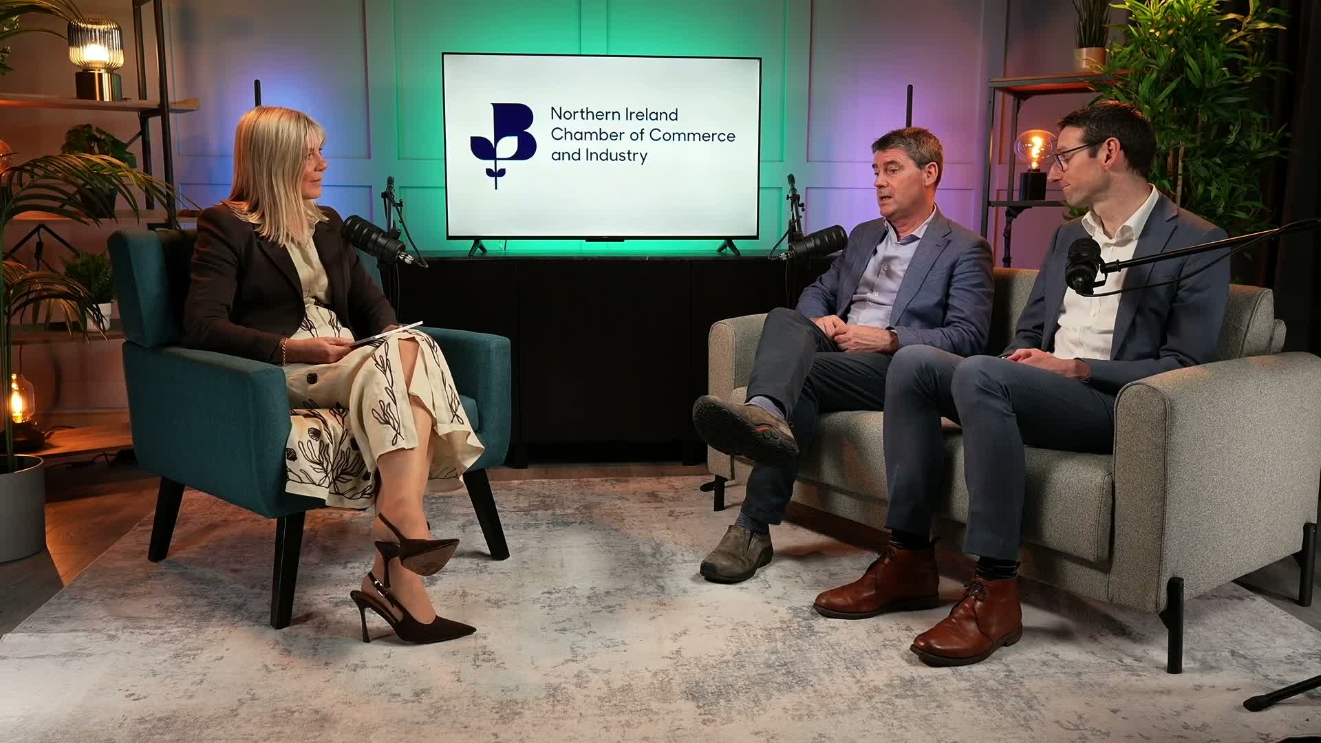 Guests recording a conversation on set at Content Lab